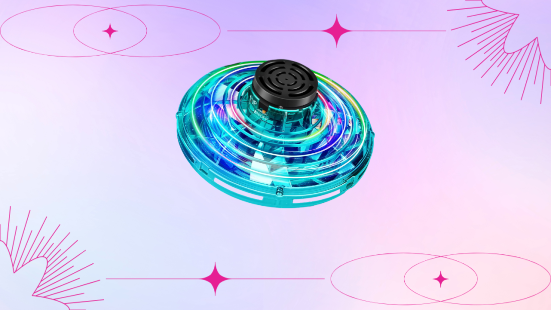 Green Flying Spinner Mini Drone with glowing LED lights hovering in mid-air during a nighttime outdoor play session.